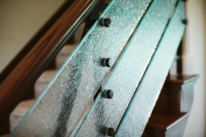 Close up of glass work on railing